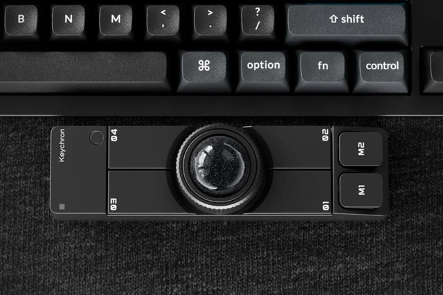 A Compact Trackball for the Professional Workspace
