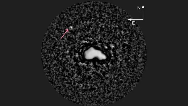 The Enigma of the System’s First Triple Asteroid
